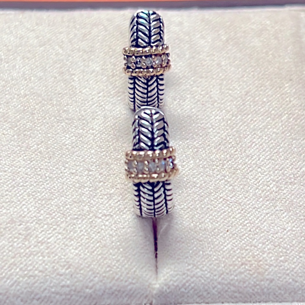 Sparkle in these  Sterling Silver Earrings with 14K Gold & Diamond accents.